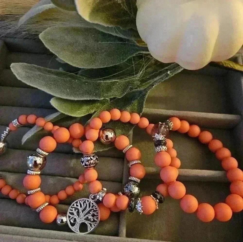 Stretch, pink, and silver bangle boho bracelets.